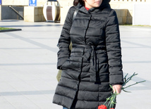 Baku residents bringing flowers to Seaside Boulevard to honor missing oil workers.  Azerbaijan, Dec.07, 2015